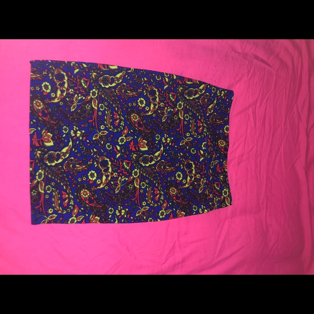 2 different colored lularoe skirts